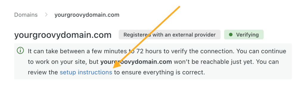 An arrow pointing to the hyperlink in the text below the domain for "Setup Instructions"